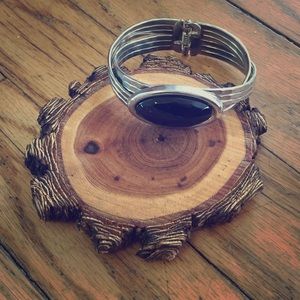 Silver bracelet with black gem